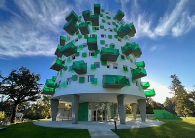 building with green balconies 